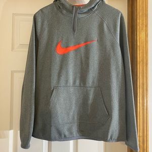 Nike woman’s DRI FIT hoodie. Neon pink swoosh